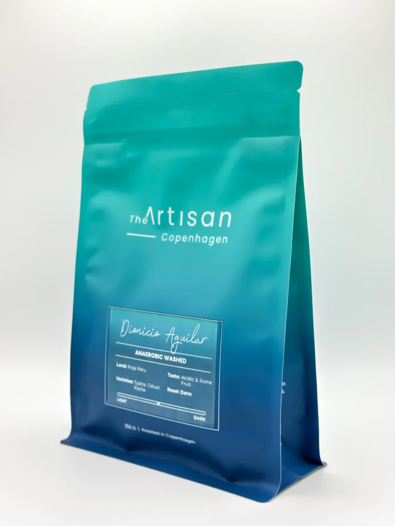 Side angle of The Artisan DA Washed Medium Roasted coffee bag showing label and packaging details
